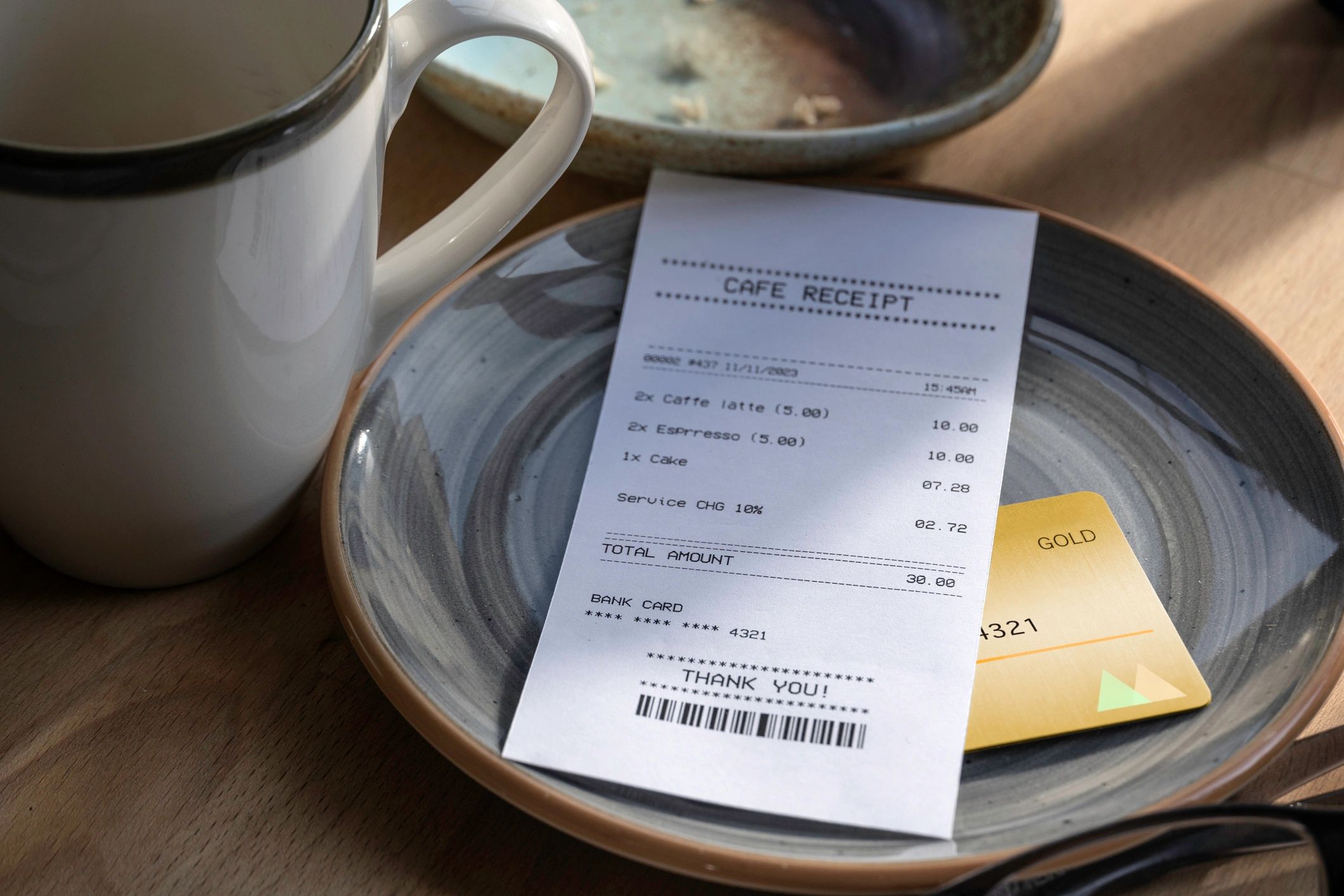 Receipt and credit card on a table